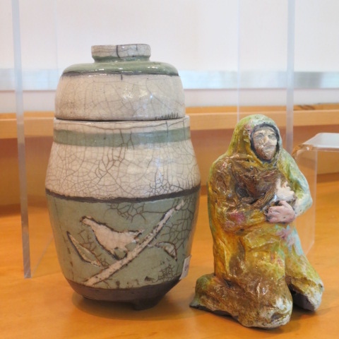 Lidded Green Pot and Homeless Man with Cat